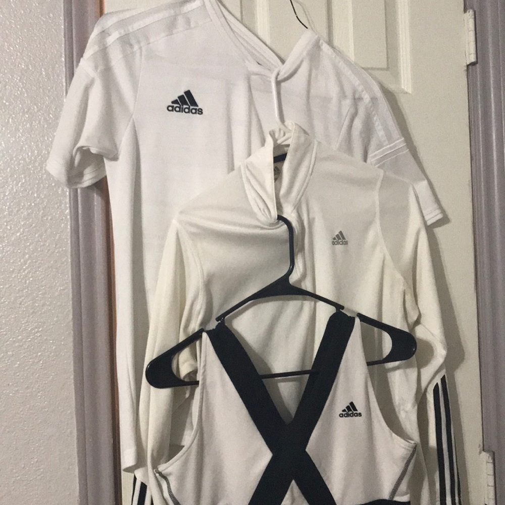 Bundle of adidas shirts, and a jacket.